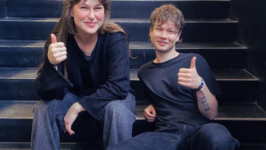 On a photo you can see two fashion degree students smiling in Metropolia campus premises